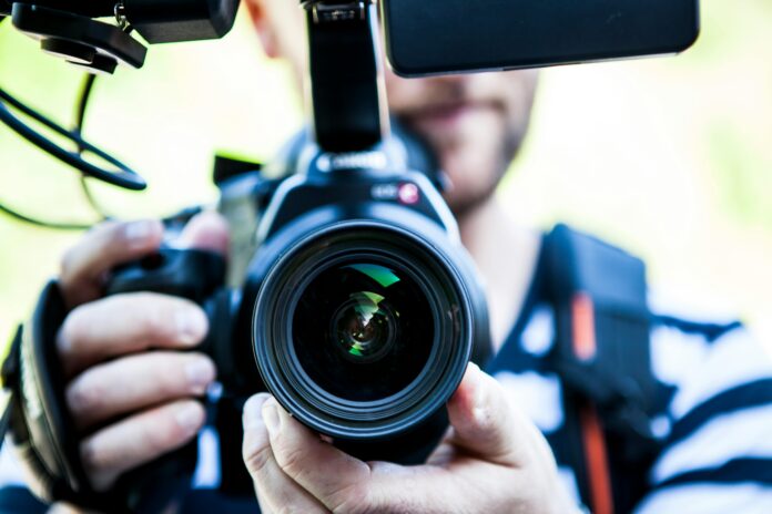 fotógrafo cámara periodista